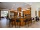 Spacious kitchen with stainless steel appliances, breakfast bar and modern accents at 725 Bear Creek Cir, Winter Springs, FL 32708