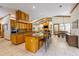 Spacious kitchen with granite countertops, an island with bar seating, and stainless steel appliances at 725 Bear Creek Cir, Winter Springs, FL 32708