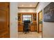 Home office including a built-in desk, shelving, and natural light at 725 Bear Creek Cir, Winter Springs, FL 32708