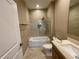 Bathroom featuring a tub/shower with tile, modern vanity and light fixtures at 7458 Brooklyn Dr, Kissimmee, FL 34747