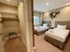 Comfortable bedroom featuring two twin beds and decorative steampunk wall clock at 7458 Brooklyn Dr, Kissimmee, FL 34747