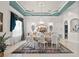 Formal dining room featuring a chandelier, marble floors, and sophisticated decor for upscale entertaining at 7957 S Park Pl, Orlando, FL 32819