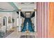 Foyer featuring spiral staircase, grand statue and opulent chandelier at 7957 S Park Pl, Orlando, FL 32819