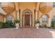 Close-up of the front door showcasing its grand entrance and design at 7957 S Park Pl, Orlando, FL 32819