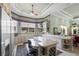 Bright kitchen with large island, countertops, and lots of natural light at 7957 S Park Pl, Orlando, FL 32819