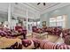 Bright living room with an adjacent kitchen and dining area at 7957 S Park Pl, Orlando, FL 32819