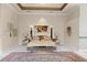 Large primary bedroom with unique architectural features and carpet at 7957 S Park Pl, Orlando, FL 32819