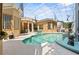 The screened-in pool offers a luxurious and private retreat for relaxation and entertainment at 7957 S Park Pl, Orlando, FL 32819