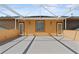 Spacious rooftop patio area with white pergola, offering an outdoor entertainment space at 7957 S Park Pl, Orlando, FL 32819