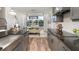Well-designed kitchen featuring sleek countertops, modern appliances, and a bright dining area with a scenic view at 861 Junonia Blvd, New Smyrna Beach, FL 32168