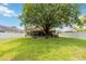The house has a screened-in porch and a large tree with lots of room in the backyard at 905 N Lake Claire Cir, Oviedo, FL 32765
