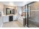 Luxurious bathroom with double vanities, soaking tub, and glass-enclosed shower at 905 N Lake Claire Cir, Oviedo, FL 32765