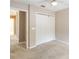 Neutral carpeted bedroom featuring a closet and natural lighting at 905 N Lake Claire Cir, Oviedo, FL 32765