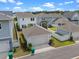 Aerial view of neighborhood featuring garages and fenced yards at 908 Tilden Oaks Trl, Winter Garden, FL 34787