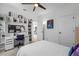Bedroom with a desk, chair, shelving and study decor at 908 Tilden Oaks Trl, Winter Garden, FL 34787