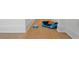 Hallway with pet bed and water bowl on light-colored wood floor at 908 Tilden Oaks Trl, Winter Garden, FL 34787