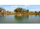 Picturesque lake view with a wooden dock at 908 Tilden Oaks Trl, Winter Garden, FL 34787