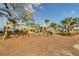 Community playground featuring swings and outdoor seating at 908 Tilden Oaks Trl, Winter Garden, FL 34787
