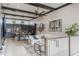 Open concept living space connecting the kitchen and living room, perfect for entertaining and Gathering gatherings at 9255 Doherty Pl, Orlando, FL 32827
