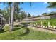 Well-maintained backyard featuring a garden area and privacy fence at 97 Desiree Aurora St, Winter Garden, FL 34787