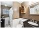Stylish bathroom featuring modern fixtures, unique shelving, and a vanity at 97 Desiree Aurora St, Winter Garden, FL 34787