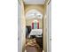 Spacious main bedroom with large windows, a ceiling fan, and warm, neutral decor at 97 Desiree Aurora St, Winter Garden, FL 34787