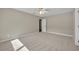 Comfortable bedroom featuring neutral carpeting, a ceiling fan, and a bright, airy atmosphere at 1005 Turkey Hollow Cir, Winter Springs, FL 32708