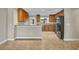 This kitchen offers wood cabinets, modern appliances, and stylish countertops at 1005 Turkey Hollow Cir, Winter Springs, FL 32708