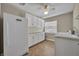 Functional laundry room with a washer, dryer, and plenty of cabinet space for storage at 1005 Turkey Hollow Cir, Winter Springs, FL 32708