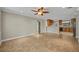 Open-concept living area seamlessly connected to the kitchen, boasting modern finishes and natural light at 1005 Turkey Hollow Cir, Winter Springs, FL 32708