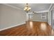 A spacious living room featuring hardwood floors, great natural light, and a ceiling fan at 1005 Turkey Hollow Cir, Winter Springs, FL 32708