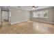 Bright living room featuring tile floors, neutral walls, and a big window at 1005 Turkey Hollow Cir, Winter Springs, FL 32708