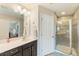 This bathroom features a single vanity, tile floors, and a tiled glass door shower at 1065 Clifton Springs Ln, Winter Springs, FL 32708