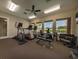 Community gym featuring exercise equipment and windows overlooking the grounds at 1065 Clifton Springs Ln, Winter Springs, FL 32708