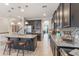 Stylish kitchen featuring a central island, granite counters, and stainless appliances at 1065 Clifton Springs Ln, Winter Springs, FL 32708