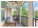 Relaxing screened porch with comfortable seating and a ceiling fan at 1065 Clifton Springs Ln, Winter Springs, FL 32708
