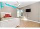 bedroom with colorful accents, a large window, and tile flooring at 1096 Dees Dr, Oviedo, FL 32765