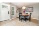 Cozy dining room with elegant round table, stylish chairs, and a charming pendant light at 1096 Dees Dr, Oviedo, FL 32765