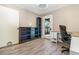 Home office offers a built-in desk, storage shelves and a door to the outside at 1096 Dees Dr, Oviedo, FL 32765