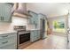 Bright kitchen offers stainless steel appliances and a window providing ample natural light at 1096 Dees Dr, Oviedo, FL 32765