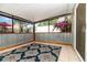Covered patio featuring tile flooring and metal railing, ideal for enjoying the outdoors at 1096 Dees Dr, Oviedo, FL 32765