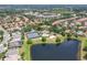 A nice community pool with a view of neighborhood homes and green common spaces at 11878 Via Lucerna Cir, Windermere, FL 34786