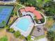Aerial view of the community pool, playground, tennis, and basketball courts at 11878 Via Lucerna Cir, Windermere, FL 34786
