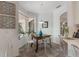 Cozy breakfast nook featuring a corner window with a view of the outdoors and modern decor at 11878 Via Lucerna Cir, Windermere, FL 34786