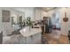 Bright kitchen with white cabinetry, stainless steel appliances, and a modern island at 11878 Via Lucerna Cir, Windermere, FL 34786