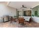 Covered patio with brick flooring, outdoor seating, and grill at 11878 Via Lucerna Cir, Windermere, FL 34786