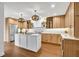Spacious kitchen featuring custom cabinets, quartz countertops, and stainless steel appliances at 1218 Fairway Dr, Winter Park, FL 32792
