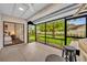 This screened patio features tile floors and backyard access, perfect for enjoying the outdoors at 1218 Fairway Dr, Winter Park, FL 32792