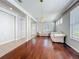 Living room with hardwood floors and neutral paint at 12724 Bideford Ave, Windermere, FL 34786