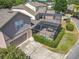 Overhead view of a home with a screened-in porch and a well-maintained yard, providing a comfortable outdoor space at 12724 Bideford Ave, Windermere, FL 34786